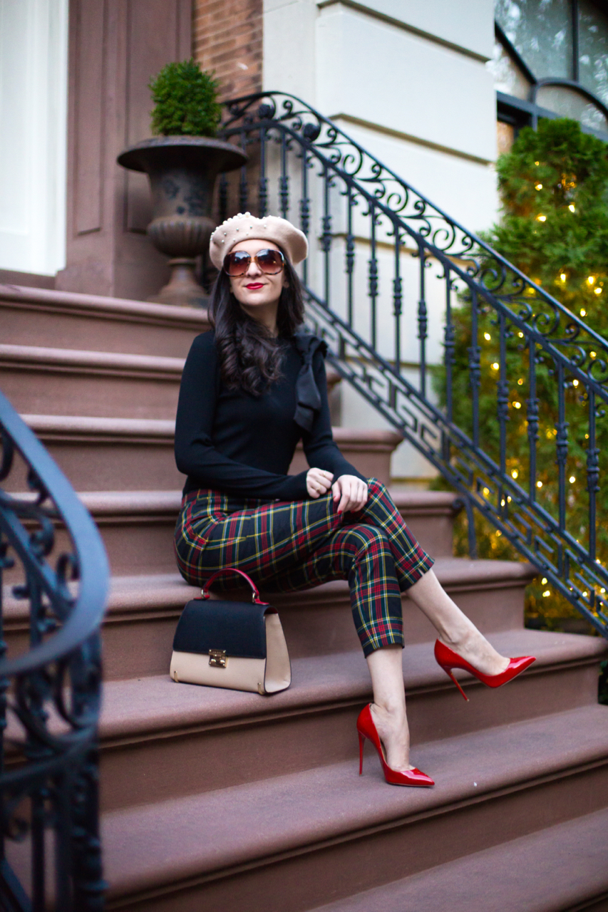 Alice olivia bow sweater, black bow shoulder sweater, ted baker bow sweater, jcrew plaid pants, jcrew black watch plaid, jcrew red plaid, jcrew black plaid, christian louboutin so kate in rouge de mars, louboutin red heel, henri bendel tri color purse, henri bendel tri color waldorf purse, asos pearl hat, asos pear beret, washington square hotel