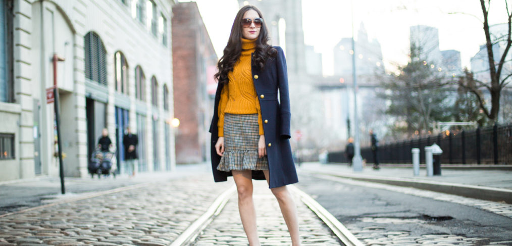 H&M knit turtleneck sweater in mustard yellow, j.crew houndstooth ruffle mini skirt, christian louboutin pigalle follies 100 mm in navy suede, j.crew ladyday coat in navy wool, dumbo, mustard knit sweater